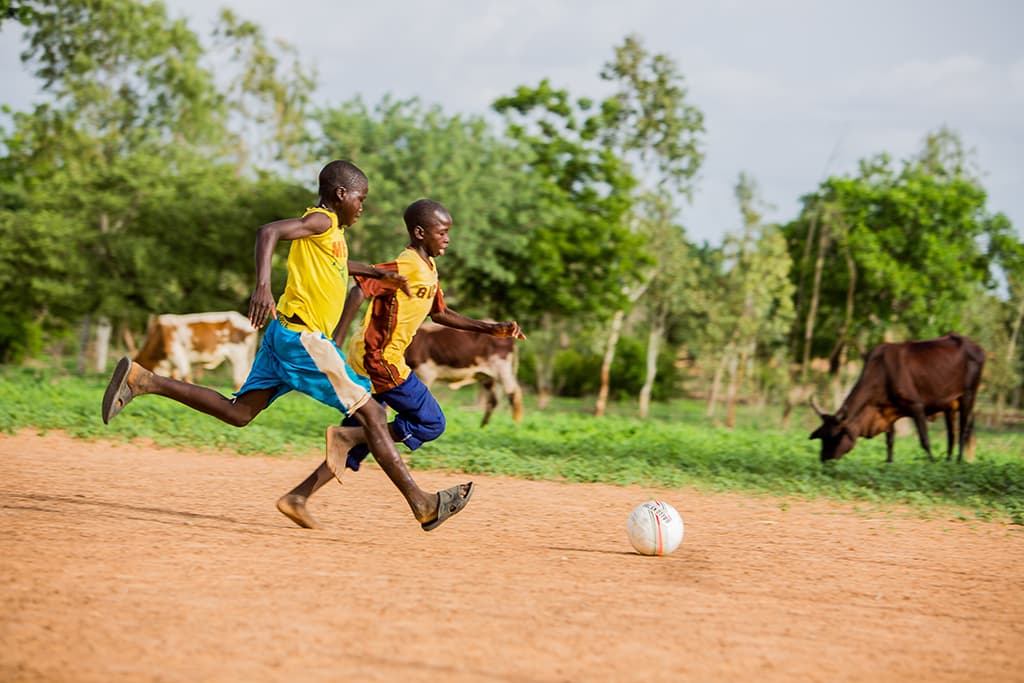 Boys playing football