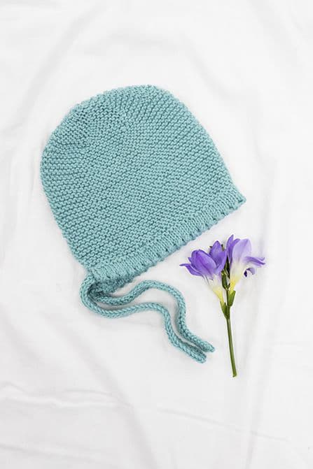 Knitted baby bonnet