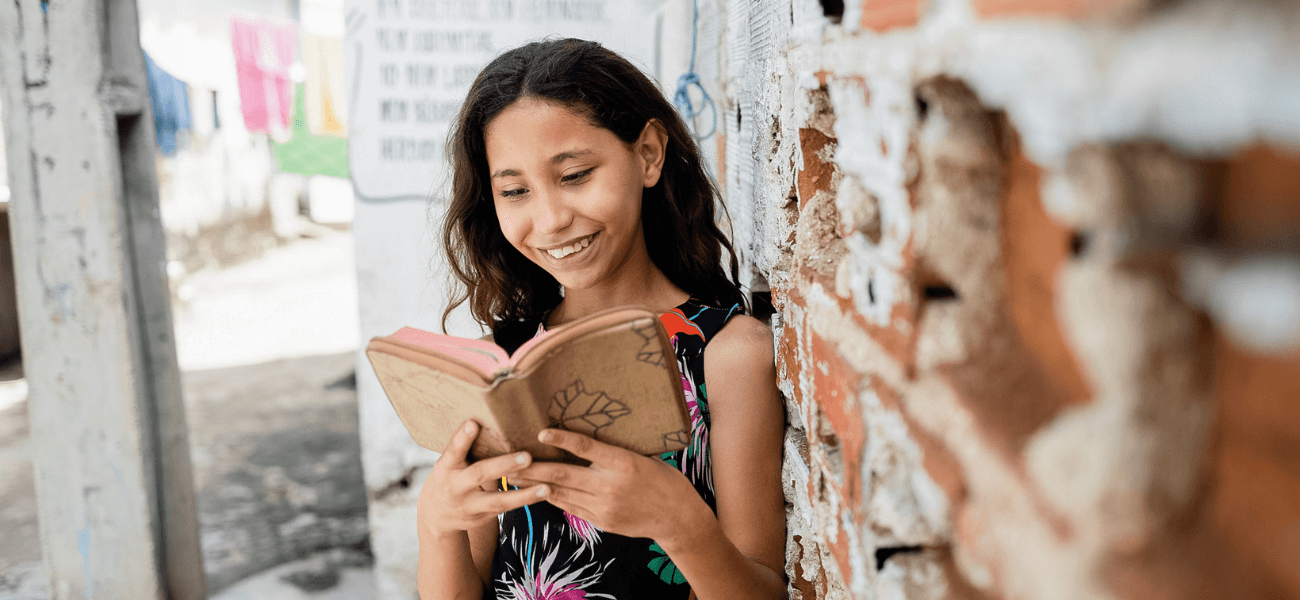 Girl reading her Bible