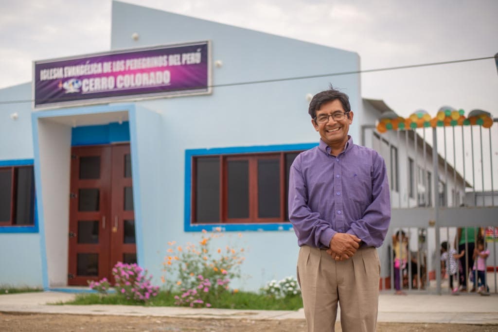 Pastor Danilo outside his church in Peru