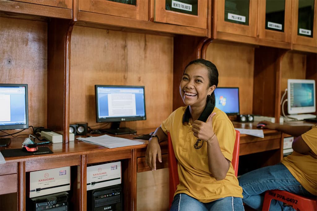 Inggrid in the computer lab at her local church.