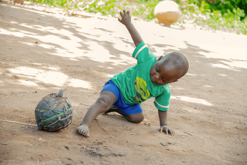 Boy with homemade football