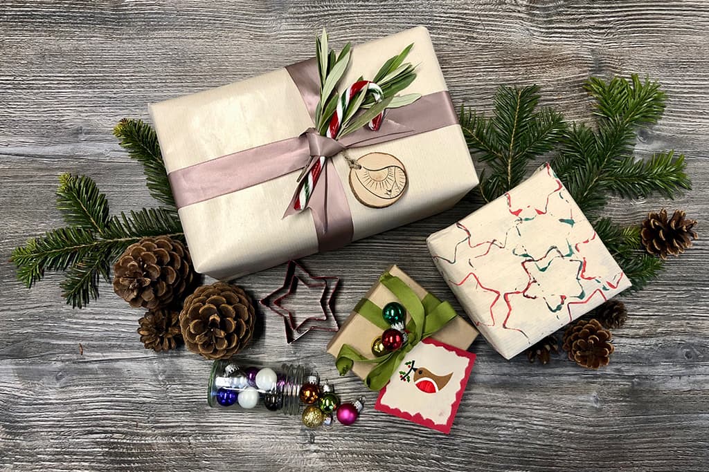 Christmas gifts wrapped in homemade wrapping paper