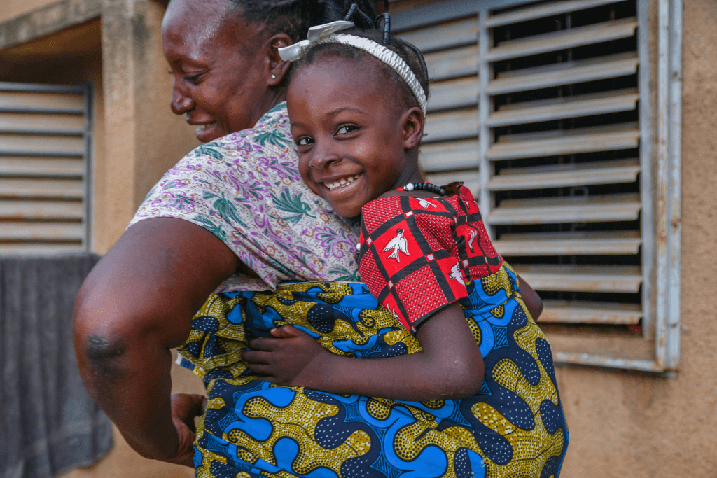 Girl smiles at the camera