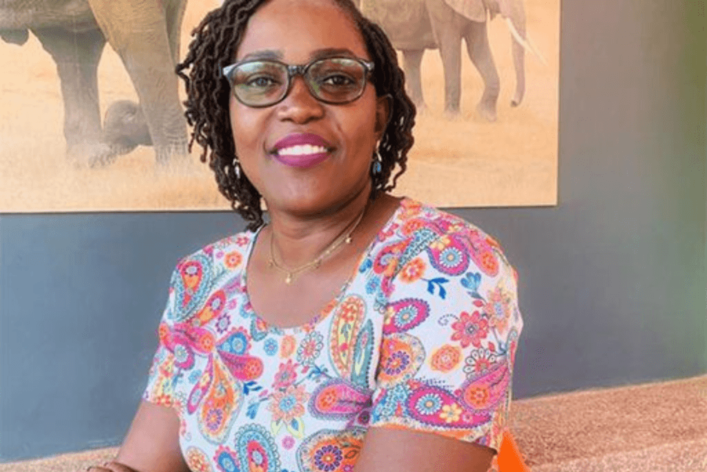 Doreen seated smiling