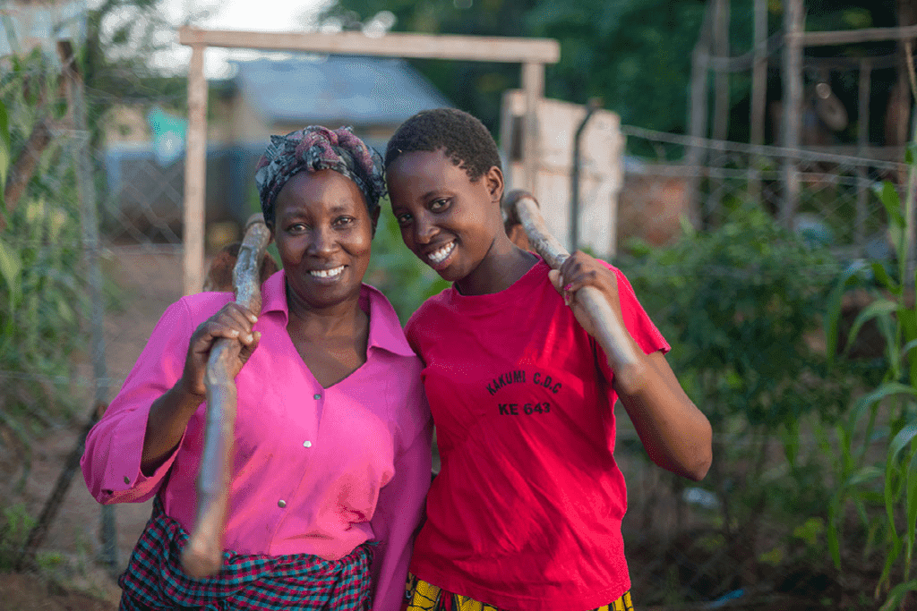 Lilian standing with her daughter